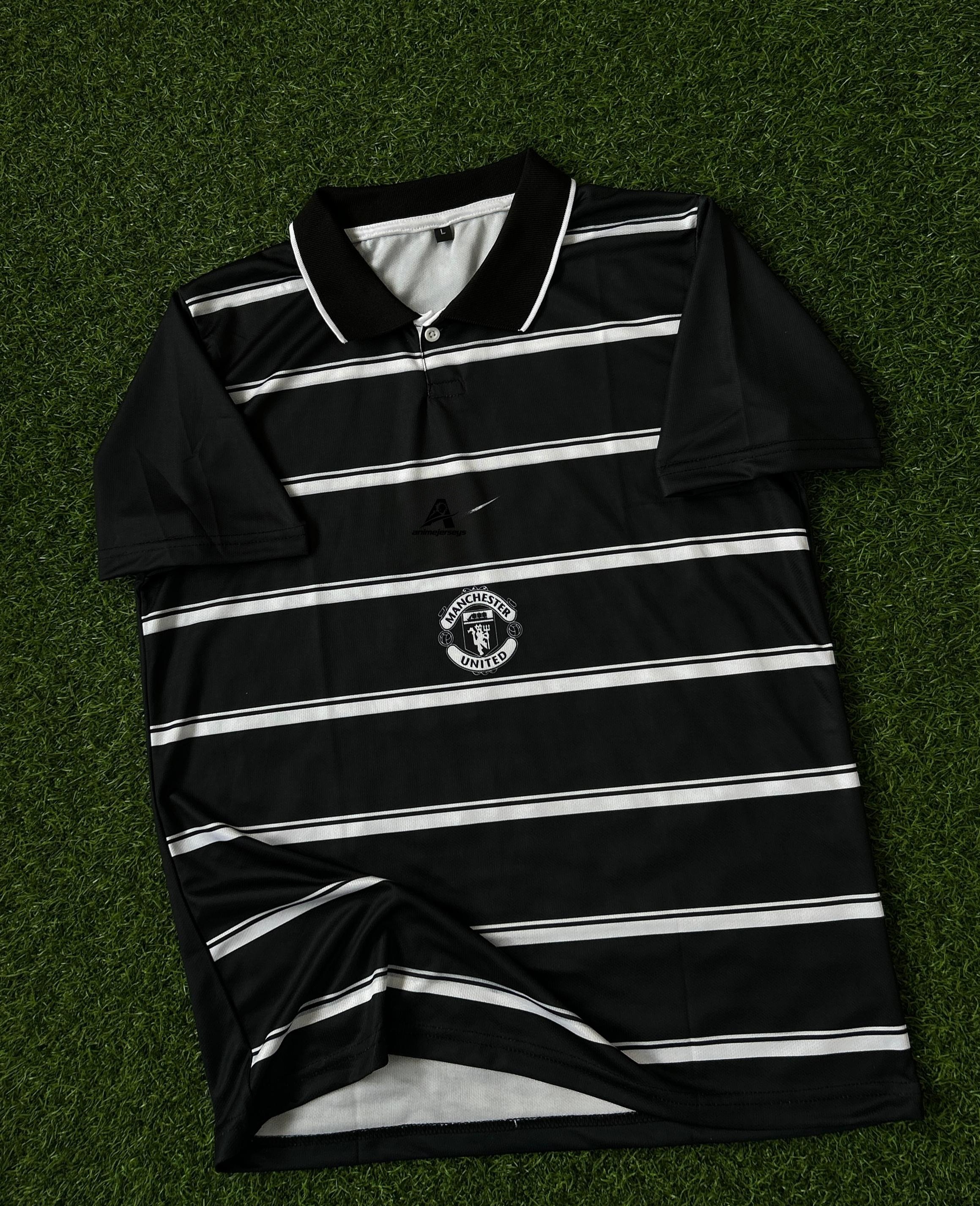 MAN UNITED RETRO KIT. HALFSLEEVE POLO SUBLIMATION